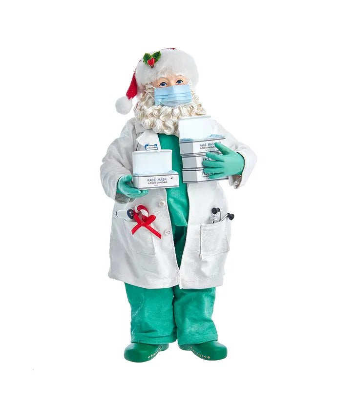 10.5" Fabriché™ Doctor Santa Holding Face Masks - Holiday Warehouse
