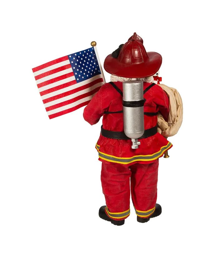 10.5" Fabriché™ Fireman With American Flag Santa - Holiday Warehouse